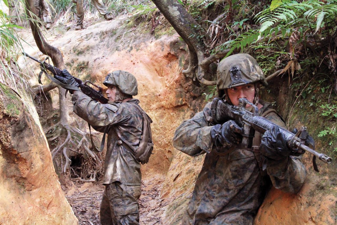 ceebee23:  CAMP GONSALVES, Okinawa, Japan - Lance Cpl. Remington Ostrem wades into