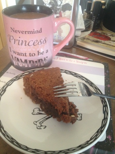 Goth kinda at the office, a still life. Working from home means coffee in one of my favorite mugs AND a brownie from the batch the Infamous BlueJay brought last night.