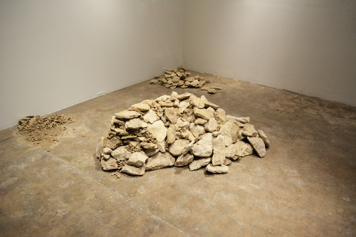 janemba:  theletteryogh:  colorthefuture:  Ruins (2015), Carlos MartielI lay in the fetal position naked on the floor of the gallery, two Caucasian men covered me with rocks until my body became invisible.  is this art?If so, I don’t get it  Well you’re