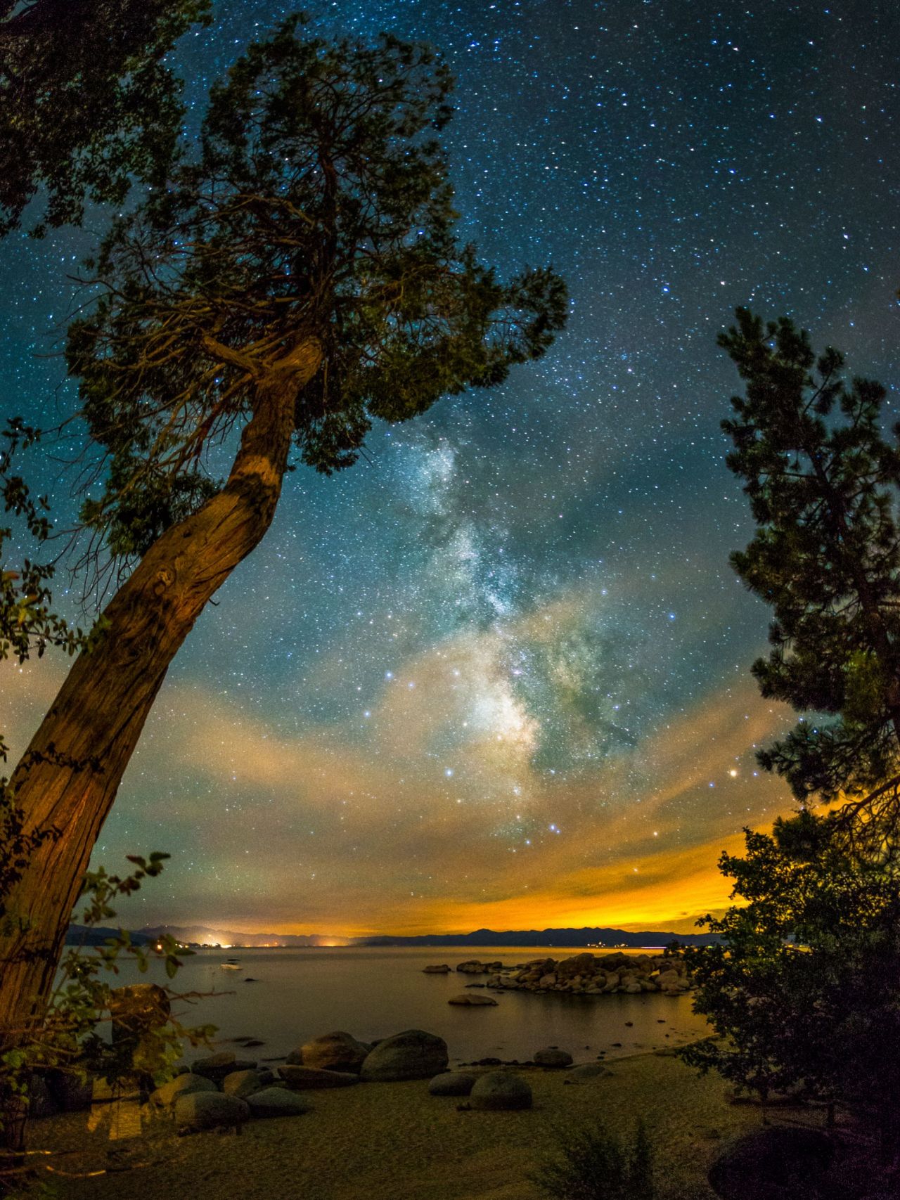 spaceexp:  Milky Way over Speedboat Beach, Lake Tahoe. Source: joetempleman (reddit)
