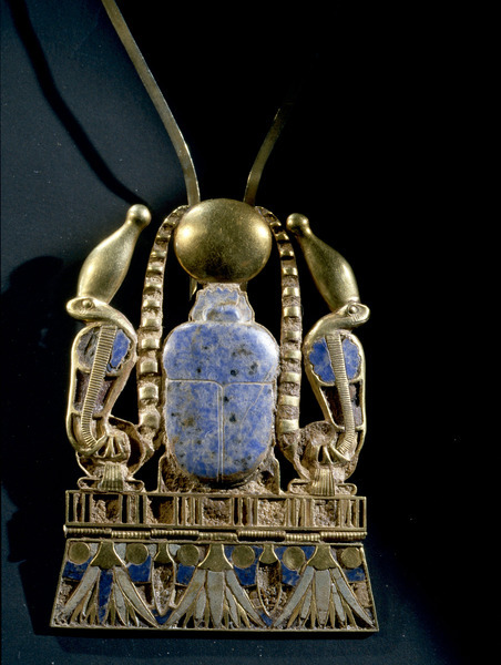 Scarab Pectoral of Shoshenq IIThe central motif is of a scarab beetle supporting the sun disc, It is