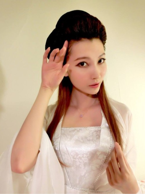 chinkqueen-li:  I get horny everytime wearing traditional chink dress, who wants to get off my clothes and help me out?