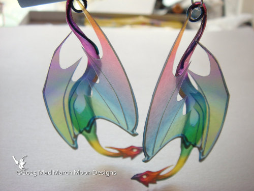 sosuperawesome:Iridescent dragon earrings, ear cuffs, hair clips, hair sticks and necklaces by MadMa