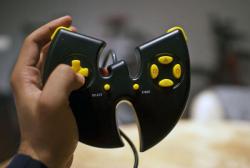 yup-that-exists:  Wu-Tang Clan PS1 Controller Some people may remember the 1999 video game that Wu-Tang Clan put out called Shaolin Style. It was basically a Mortal Kombat rip off with the Wu-Tang name in front of it, but the coolest part about it is