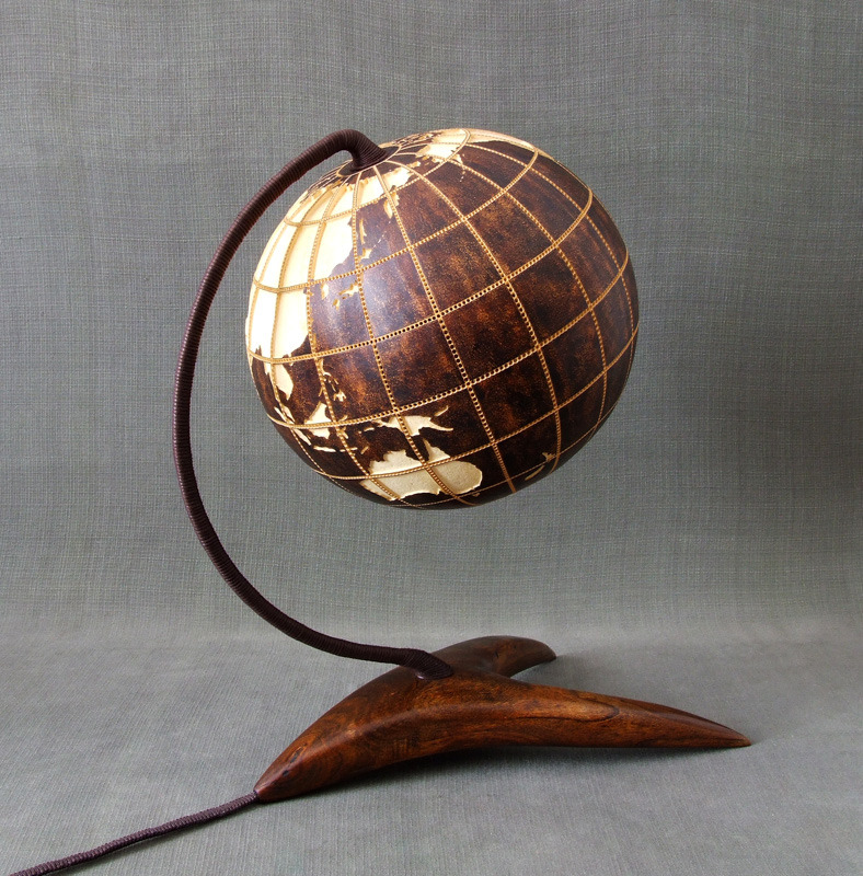 psychoactivelectricity:  This lamp is made of Senegalese gourd.   Meridians and circles