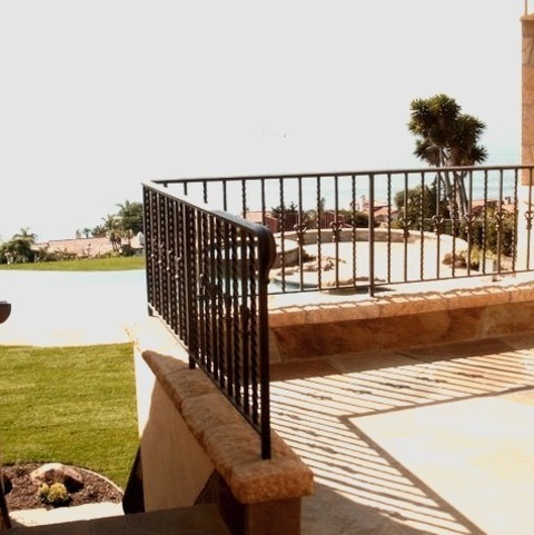 Santa Barbara Patio Natural Stone PaversPatio - Mid-sized Mediterranean Backyard Stone Patio Idea With