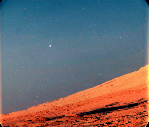 space-pics:Mars Moon Phobos Seen At Martian Twilight