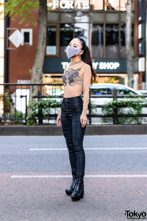 Japanese nurse Saya on the street in Harajuku wearing a chainmail face mask with a sheer top by I.Am