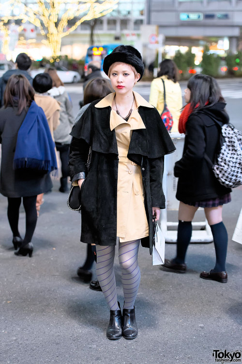 Tokyo hair salon staffer Hiromi on the street in Shibuya with a resale look that features layered co