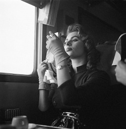 avagardner: Sophia Loren sleeps inside a train on her way to visit US Military, 1950.