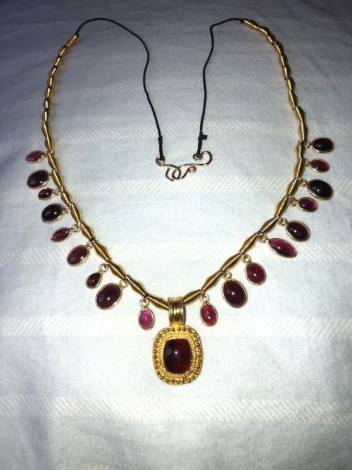 The garnet necklace I made for my garb and some photos of the artifacts I based it on. It’s for a 7t