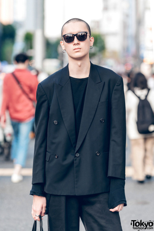 Japanese model Kazuki on the street in Harajuku wearing an all black look by legendary designer Yohj