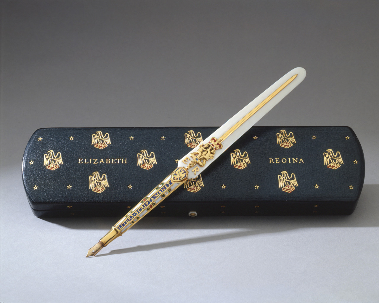 longliveroyalty:  Gold enameled and jeweled ivory pen used by Queen Elizabeth II