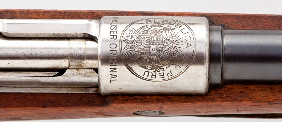 peashooter85:  An excellent condition Model 1909 Peruvian Mauser bolt action rifle.