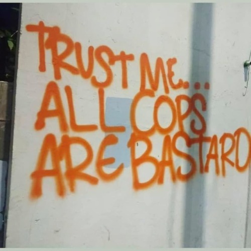 &ldquo;Trust me&hellip; All Cops Are Bastards&rdquo; Seen in Jakarta, Indonesia