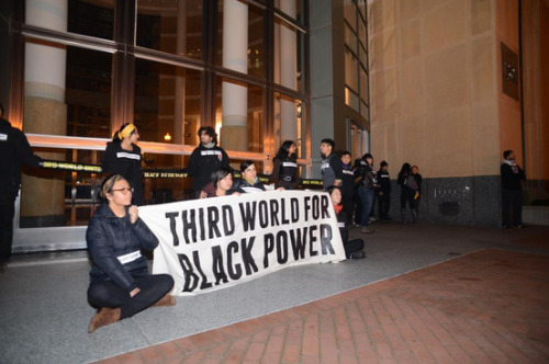 curlyteekay:  18mr:  About 25 activists locked themselves together to block two entrances of the Ronald Dellums Federal Building in Oakland Friday morning, check out the Storify and live feed here!   It’s amazing to see minorities stand together. I