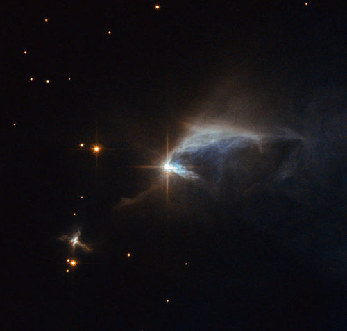 Protostar HBC 1, surrounded by an envelope of dust.A protostar is a very young star in the initial p