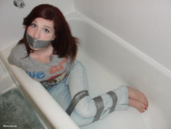 gagged4life:  Silver duct tape gags go with anything, but they go especially well with grey t-shirts and blue jeans.