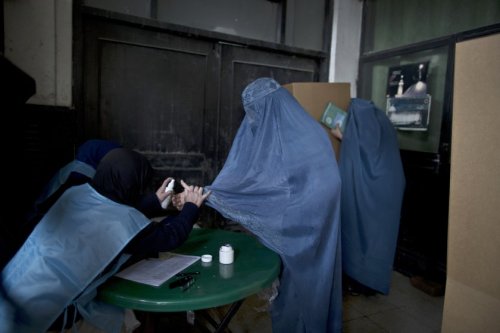 policymic:  Afghan women defy the Taliban and vote  &ldquo;The people out there are scared as he