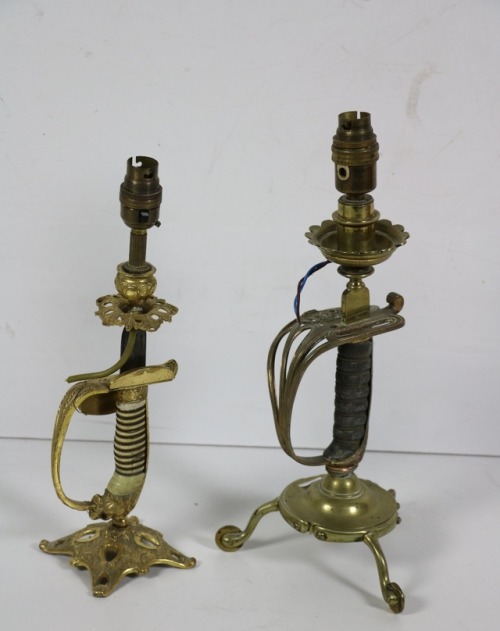 victoriansword:Sword Lamps: Your Best Defense Against the Dark!On the left is an Imperial German nav
