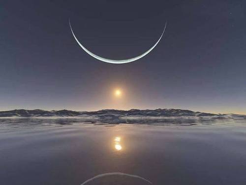 Sunrise at the North Pole with the moon at its closest point