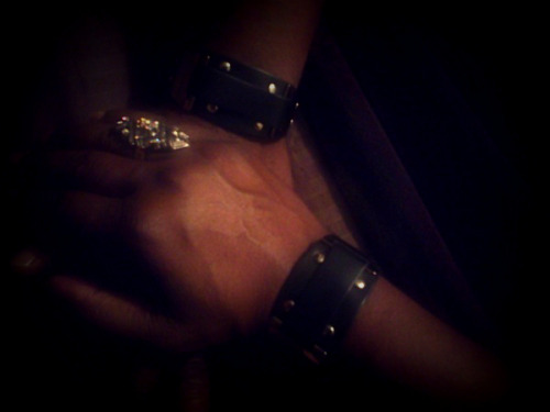 kinkybutterfly:  Matching leather & chrome wrist cuffs! More symbolism… We’re each wearing these beautiful cuffs complete with that intoxicating leather smell and the cold smoothness of motorcycle chrome. I love these! Thank you Sir! 