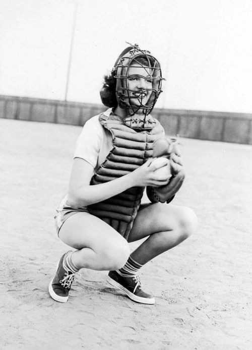 Rita Hayworth is a catcher for a women&rsquo;s softball team in the film Girls Can Pla