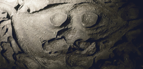 Depictions of hell and torture on the 12th C Doom Stone in York Minster- UK 