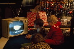 2othcentury:Boys watching the broadcast of