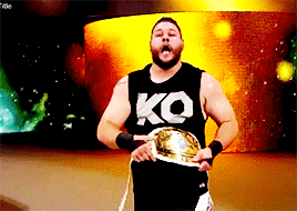 mithen-gifs-wrestling:  Kevin Owens, Night of Champions 2015.  One of the things I love about wrestling is watching the moment when a wrestler holds a new title and the look on their face shifts from “acting happy that I won this” to “being joyous