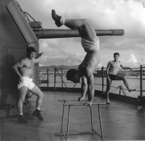 mysomethingtoremember:  “Men Having A Workout On Deck” by Horace Bristol - May 1945