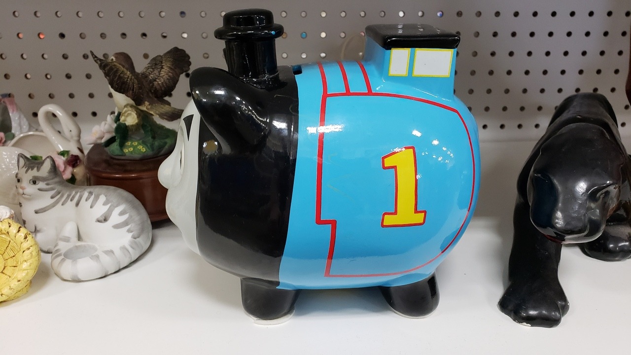 shiftythrifting: A quite horrifying Thomas the Tank Engine piggy bank, courtesy of
