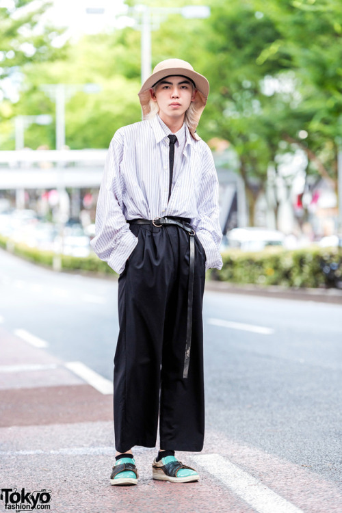 Japanese beauty school student Ayumu on the street in Harajuku wearing layered shirts by the Japanes