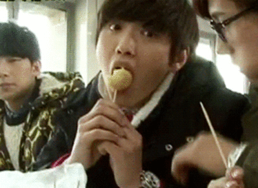 replay3:  Sandeul enjoying “a bite”.of his favorite food….. 