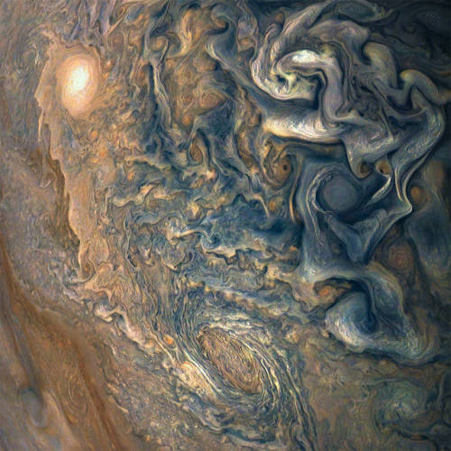 Swirls of Jupiter Jupiter is a very stormy, turbulent, violent planet. The planet completes a day (o