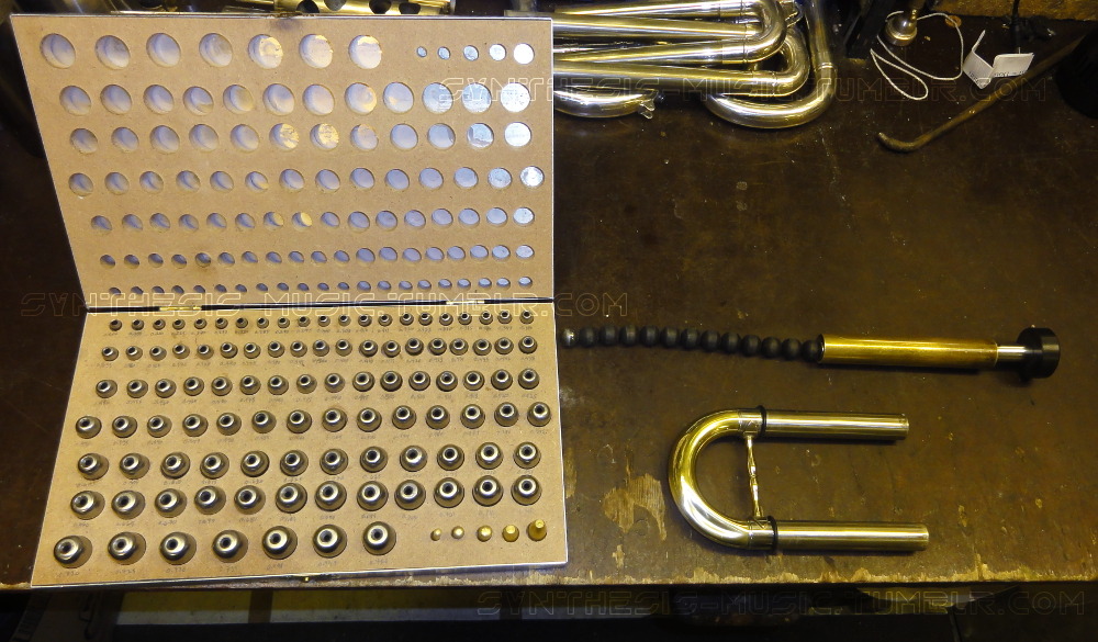synthesis-music:  Dent in a tuba tuning slide (along with a crushed bell, broken