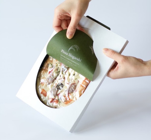 Masahiro Minami Design created packaging for a unique pizza made with rice flour from Shiga, Japan