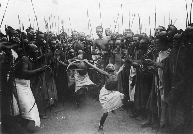 atomickong:  Young Tutsi boys dance and reenact “bow-and-arrow combat”, Rwanda