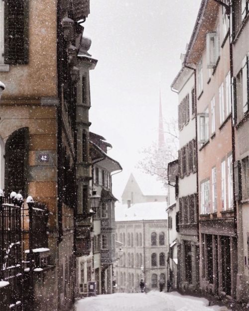 Morning in Zürich by Rufus Bixton“I buy fresh brown bread from the bakery in the corner that opens a