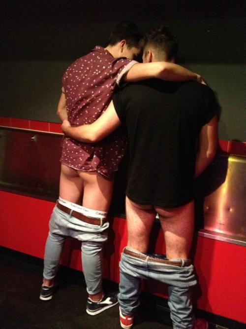 ineedtopiss4u: Brotherly love at the clubs trough urinal I love you bro