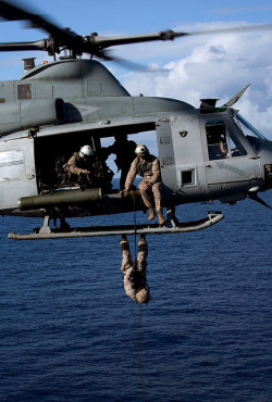 militaryandweapons:  Hanging on a Huey by United States Marine Corps Official Page on Flickr. 