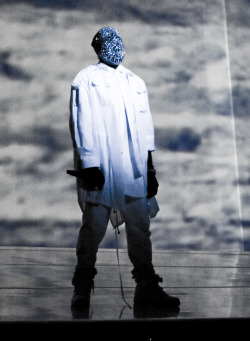 vuittonv:  Kanye West wears crystal-embroidered mask from Maison Martin Margiela’s Autumn 2012 Artisanal collection during a performance on December 28, 2012. 