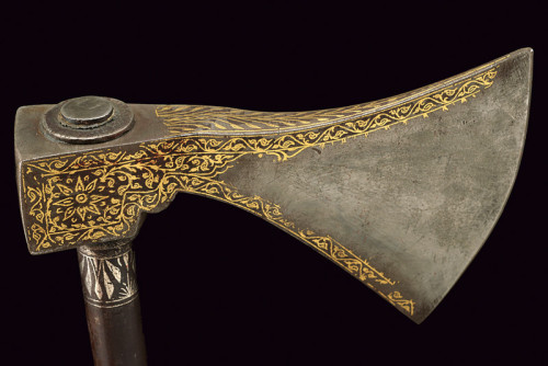 art-of-swords:Battle AxeDated: 19th centuryProvenance: Indopersia Measurements: overall length 56.5 