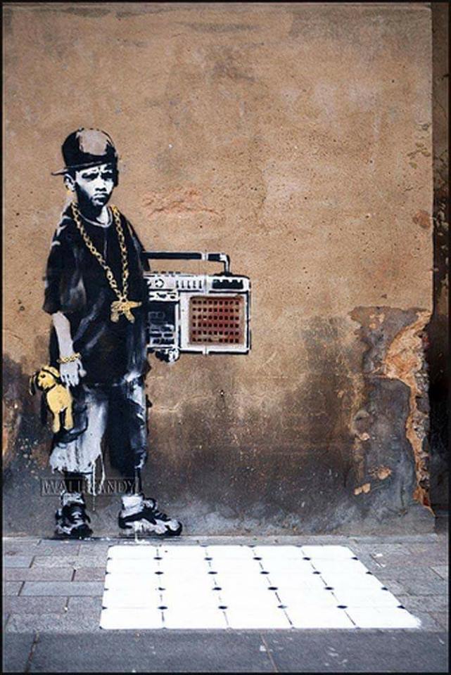 old school hip hop kid bboy with his teddy bear
location: dalston, London, England art by Banksy