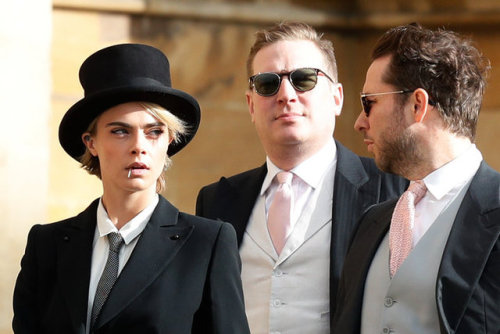 cheskamouse:  thecarolinebelle: Cause of Death: Cara Delevingne wearing tails and chewing a toothpick at the Royal Wedding.  Wedding? I thought she was off to kick someones ass. 