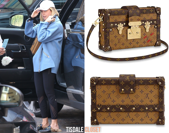 Ashley Tisdale carrying a Louis Vuitton shopping bag while out