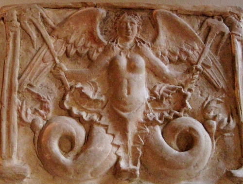 Scylla on an Etruscan urn.  Taken at the National Archeological Museum, Florence.