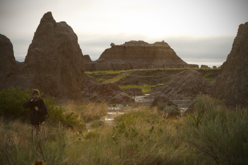 sunrise hike in the badlands walking with my best friend while he glide-cams the awesome landscape