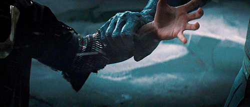 lokihiddleston: Cinematic Parallel -Sylvie touched his arm that turned blue in contact with a Frost 