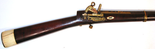 Early 19th century Circassian flintlock musket with gold inlay and ivory butt.